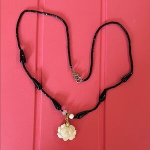 Elegant Black and White Floral Necklace